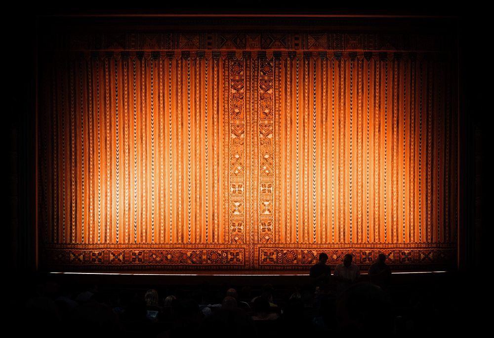 Theater curtain on stage. Original public domain image from Wikimedia Commons