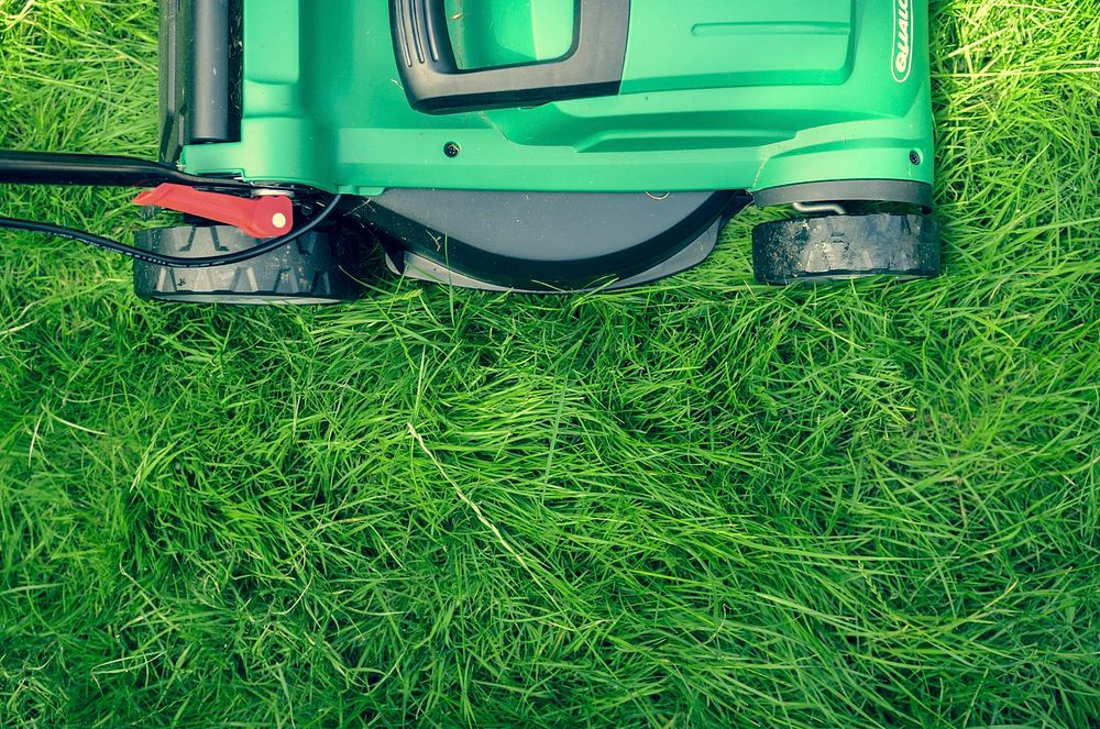 Green and black lawnmower. Original public domain image from Wikimedia Commons