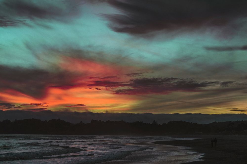 Colorful skies after sunset above the sand beach coastline at Stinson Beach. Original public domain image from Wikimedia…