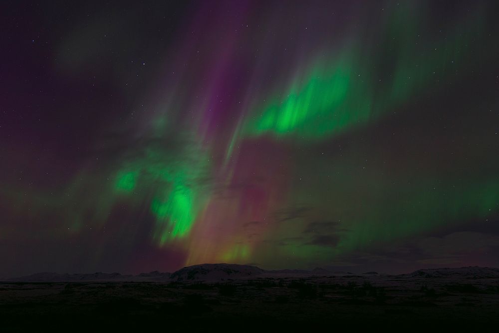 Aurora northern lights background. Original public domain image from Wikimedia Commons