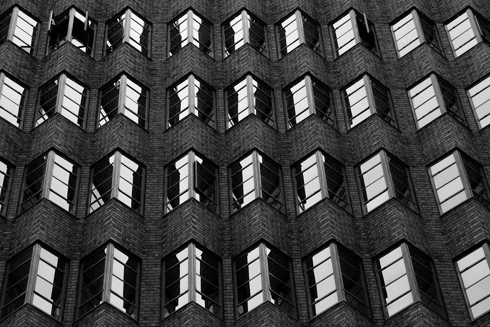 Black and white shot of jagged wall architecture with windows in Pitt Street. Original public domain image from Wikimedia…