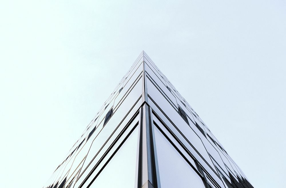The corner of an all glass building in Berlin. Original public domain image from Wikimedia Commons