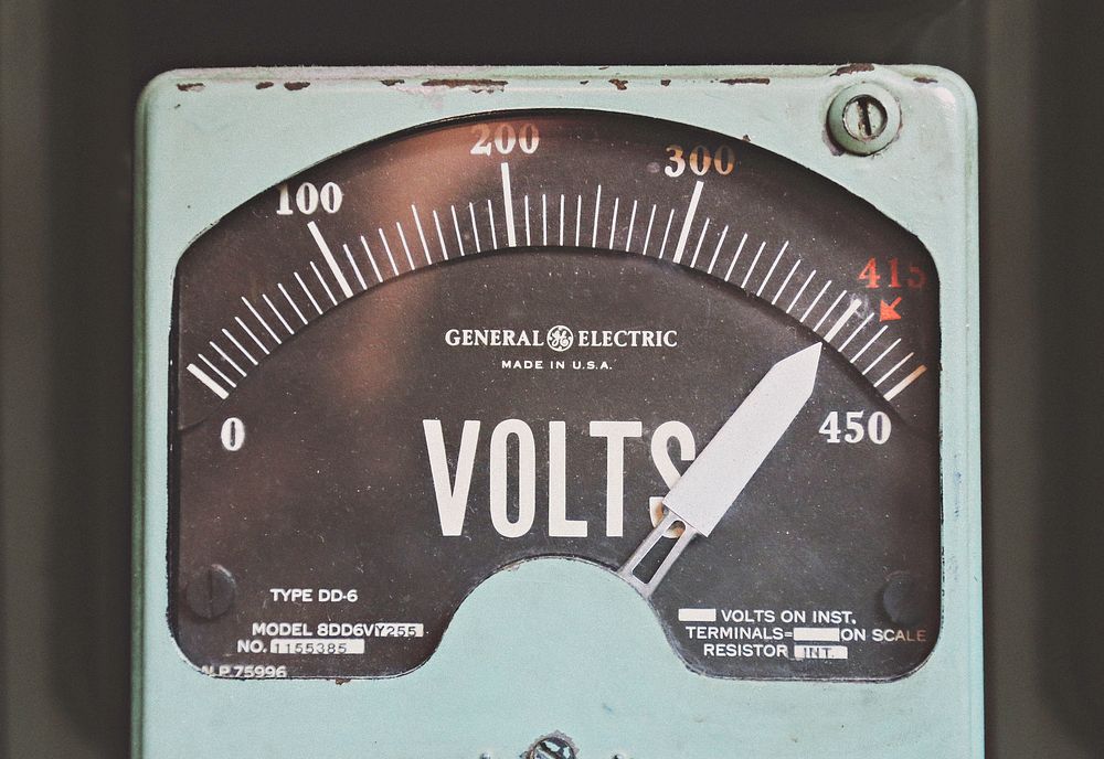 Close-up of the dial of an old voltmeter. Original public domain image from Wikimedia Commons