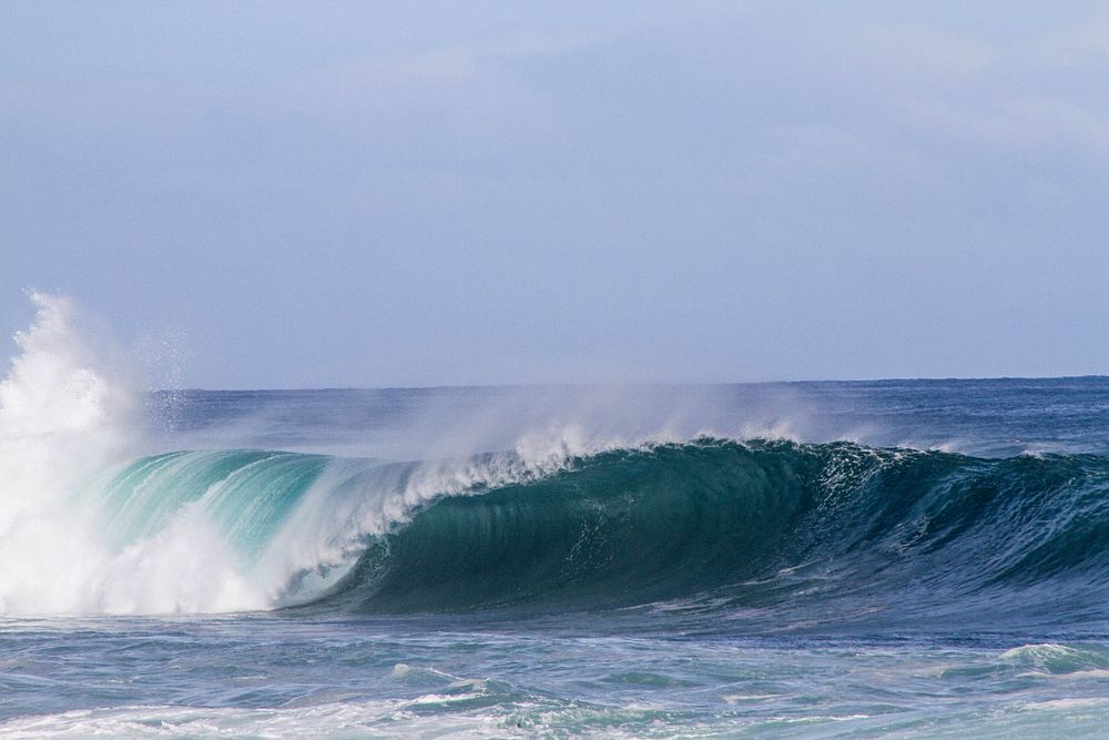 Splashing waves and sea spray in the ocean. Original public domain image from Wikimedia Commons