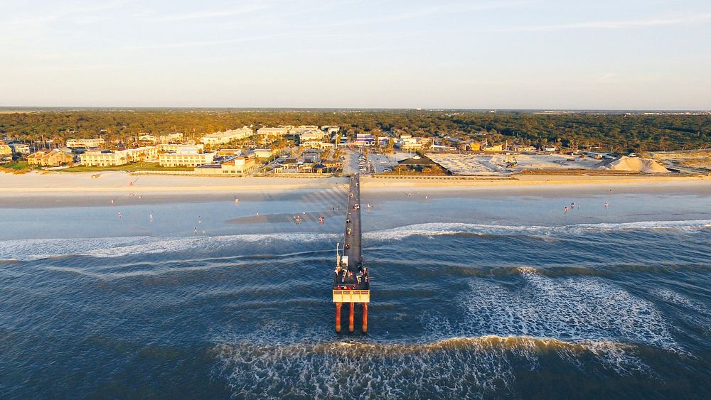 Drone view of an ocean pier in the coastal town of St. Augustine, Florida.. Original public domain image from Wikimedia…