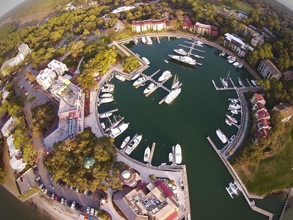 An overhead shot of the marina, yachts and the resort at Harbour Town Golf Links.. Original public domain image from…