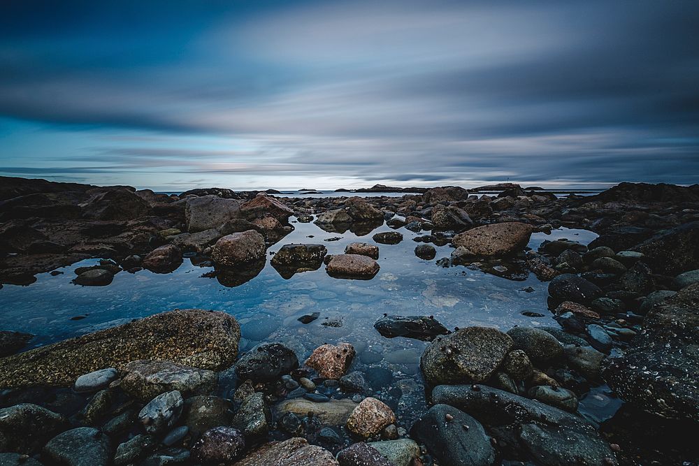 Rocky shore of the ocean. Original public domain image from Wikimedia Commons