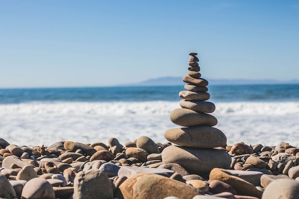 Stone balancing with pebble tower on the Ventura rocky beach. Original public domain image from Wikimedia Commons