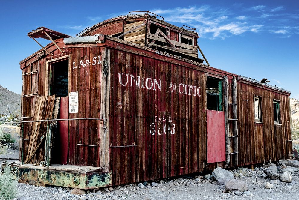 Old abandoned train car in the desert of Rhyolite. Original public domain image from Wikimedia Commons