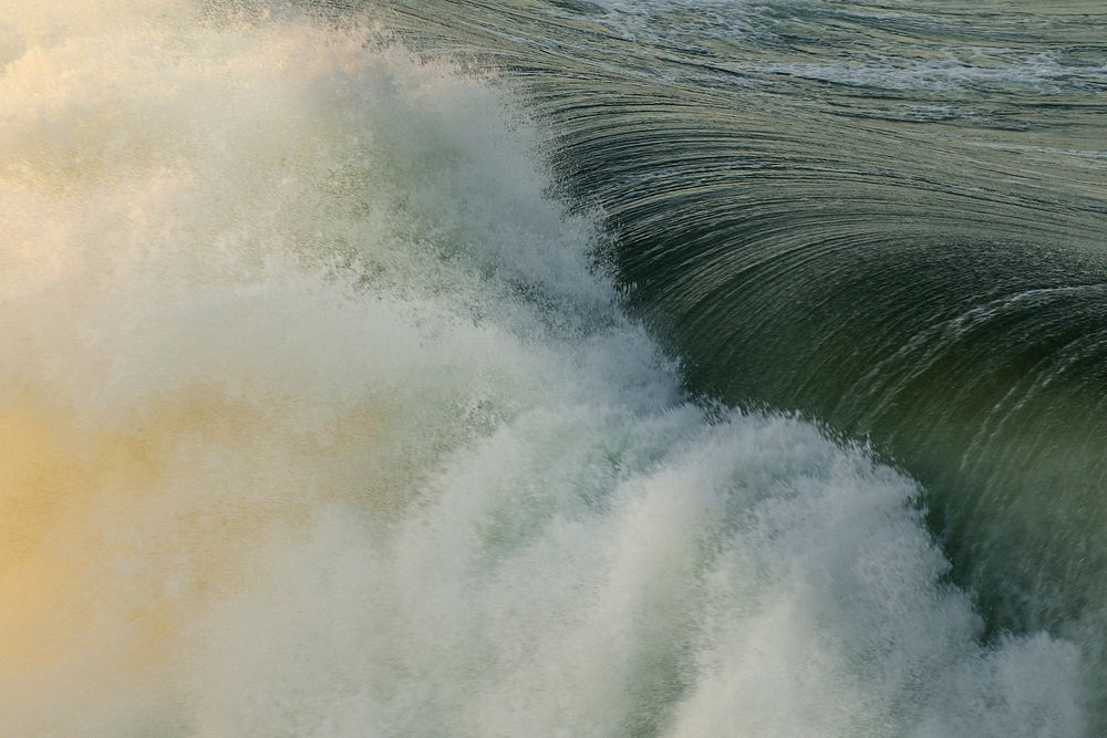 Ocean wave crashing at Huntington Beach. Original public domain image from Wikimedia Commons