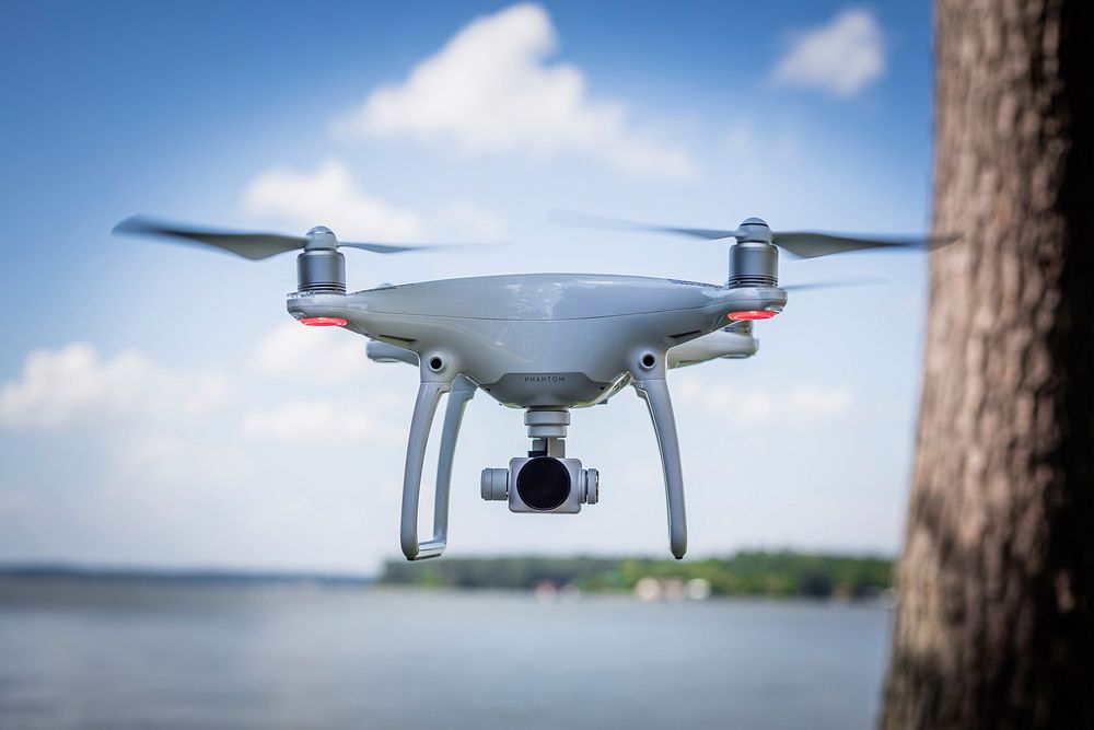 Drone camera hovering mid flight outside. Original public domain image from Wikimedia Commons