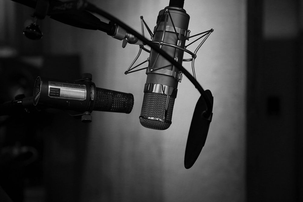 Dynamic microphone in recording studio. Original public domain image from Wikimedia Commons