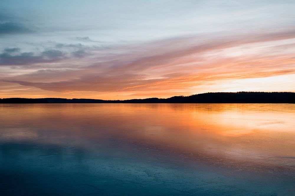 Sunset lake reflection scenery with sky. Original public domain image from Wikimedia Commons