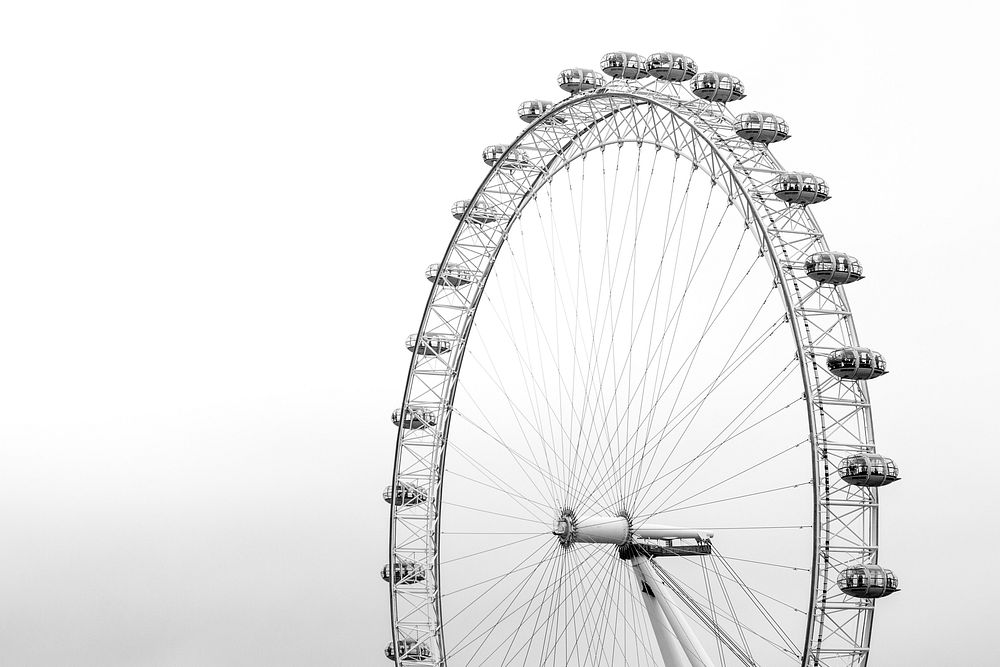 A black-and-white shot of the London Eye. Original public domain image from Wikimedia Commons