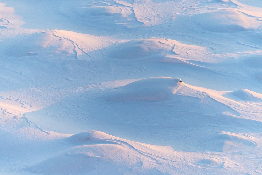 Mounds of snow covering the ground on a hill in Cherepovets, Russia. Original public domain image from Wikimedia Commons