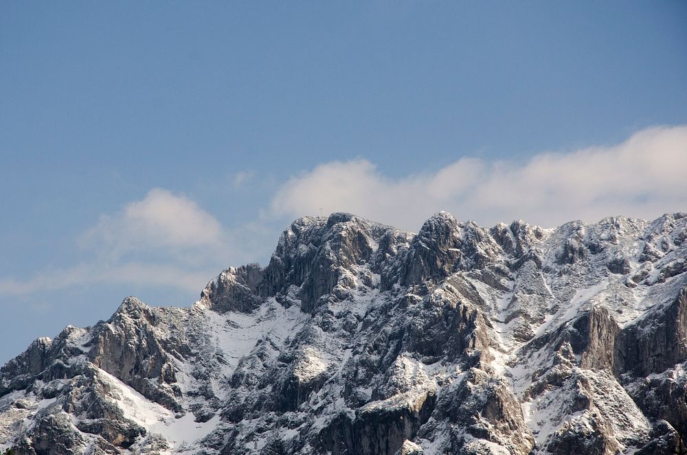 Rock and peaks topped with snow in Gmunden, Austria. Original public domain image from Wikimedia Commons