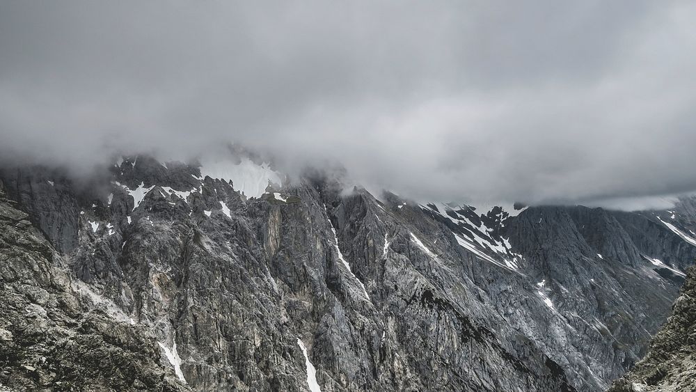 Fog covers the mountain tops of Wankspitze in Tyrol, Austria. Original public domain image from Wikimedia Commons