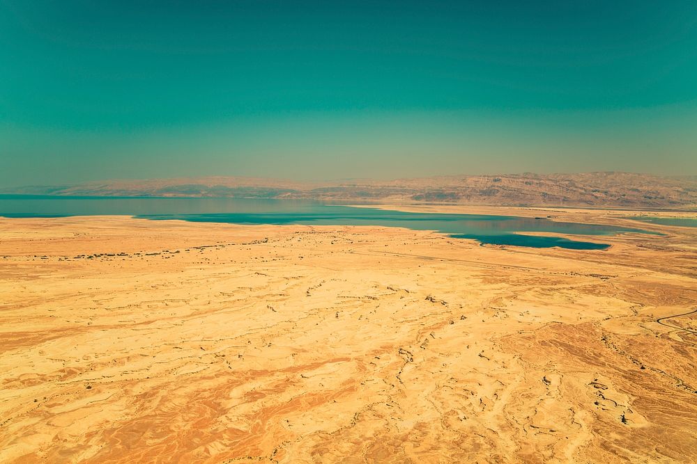 Deserted sands near the The Dead Sea. Original public domain image from Wikimedia Commons