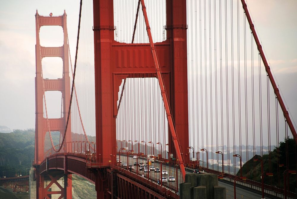 Traffic drives over Golden Gate Bridge. Original public domain image from Wikimedia Commons
