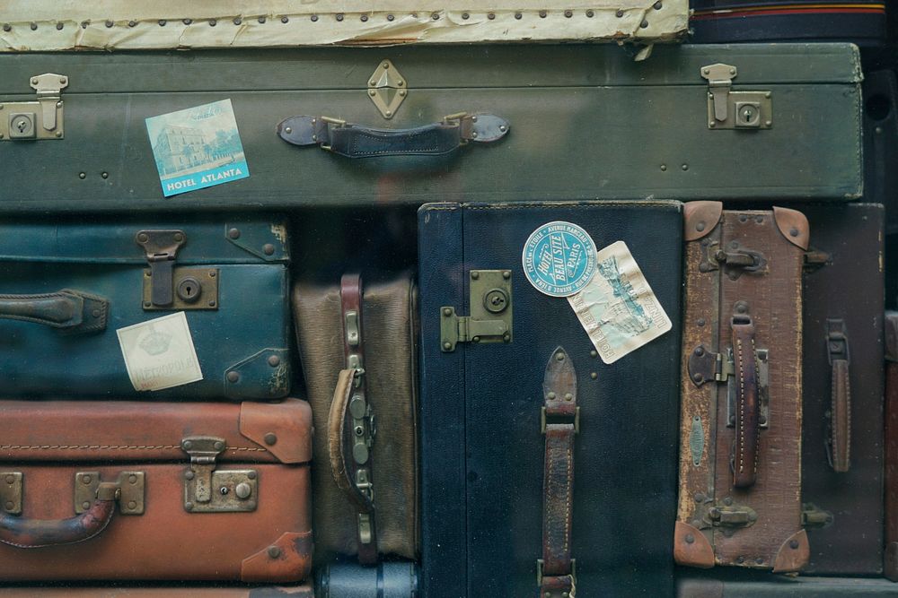 A stack of old suitcases. Original public domain image from Wikimedia Commons