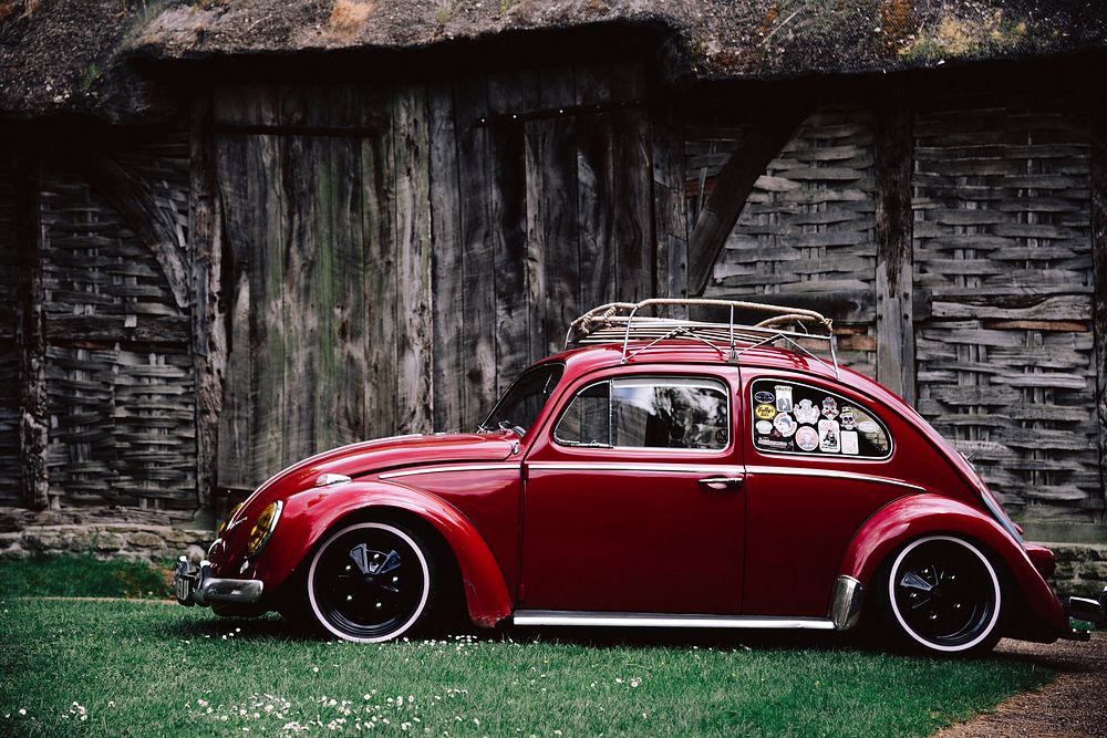 Red old beetle car. Original public domain image from Wikimedia Commons