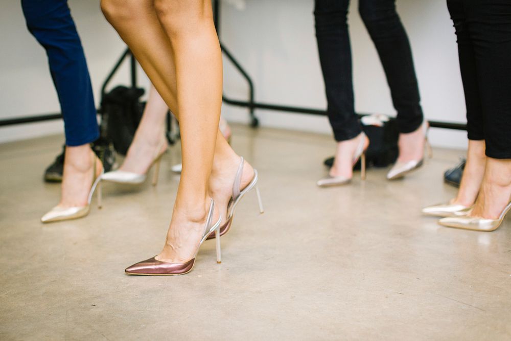 Four women wearing assorted heels. Original public domain image from Wikimedia Commons