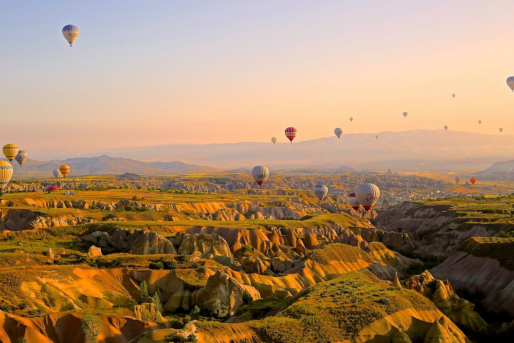 Hot air balloons over the valley. Original public domain image from Wikimedia Commons