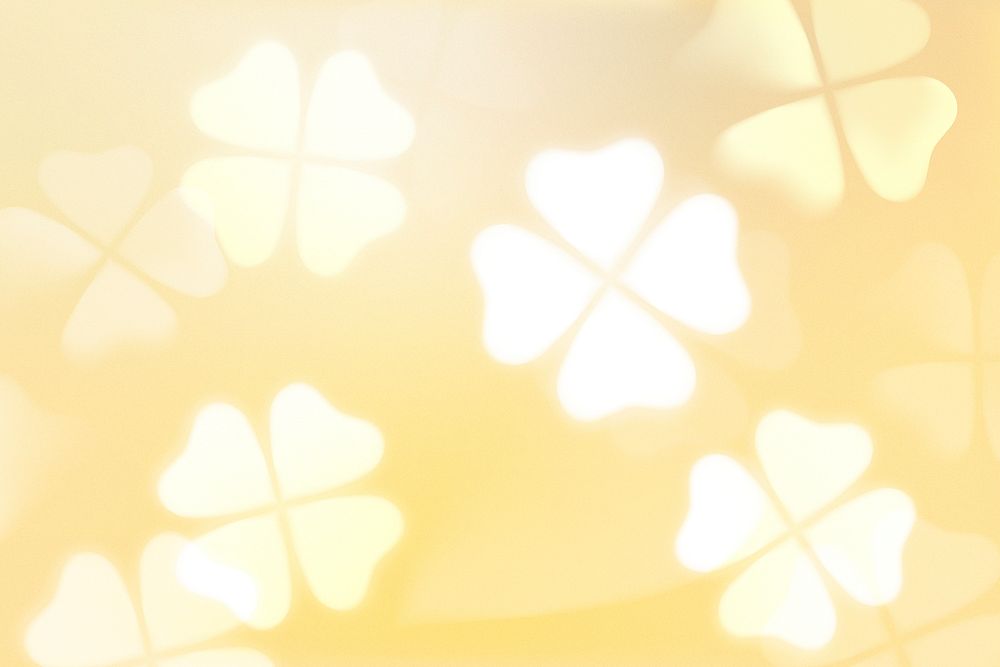 White clover leaf yellow background bokeh light psd