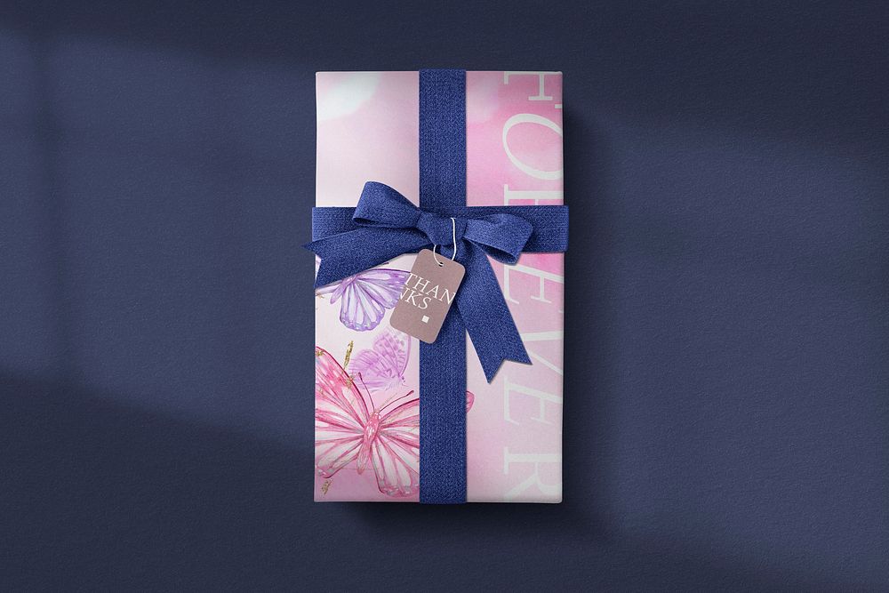 Gift box mockup, pink butterfly, flat lay design psd