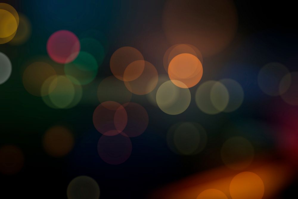 Colorful bokeh lights patterned background vector