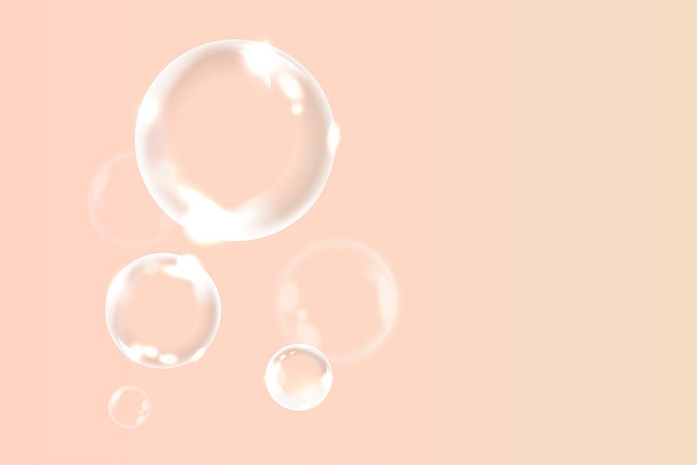 Soap bubbles on a peach background vector