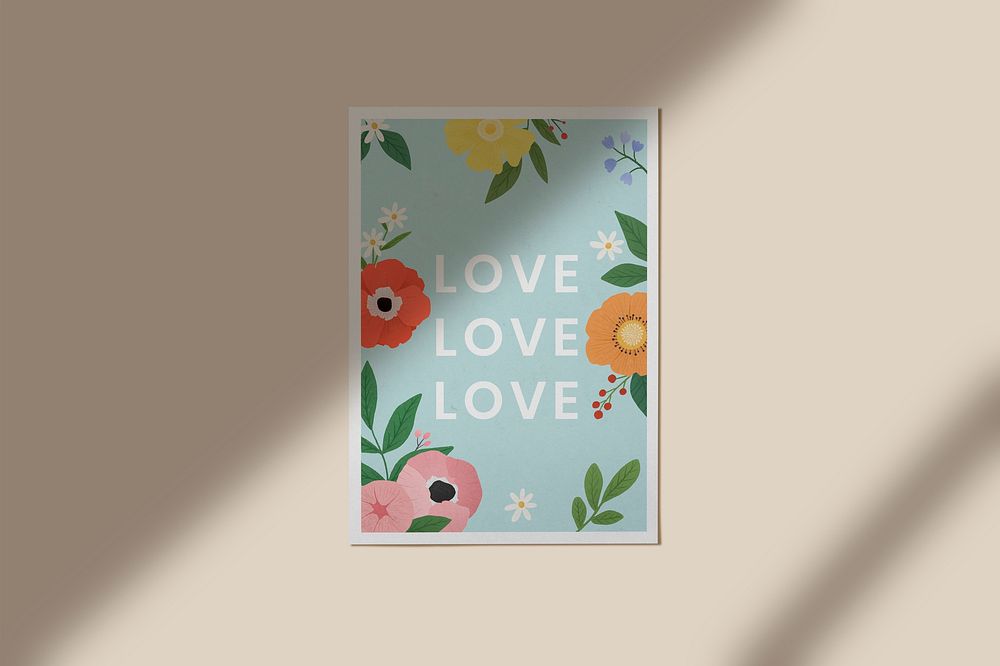 Painted flower with love in a frame on the wall