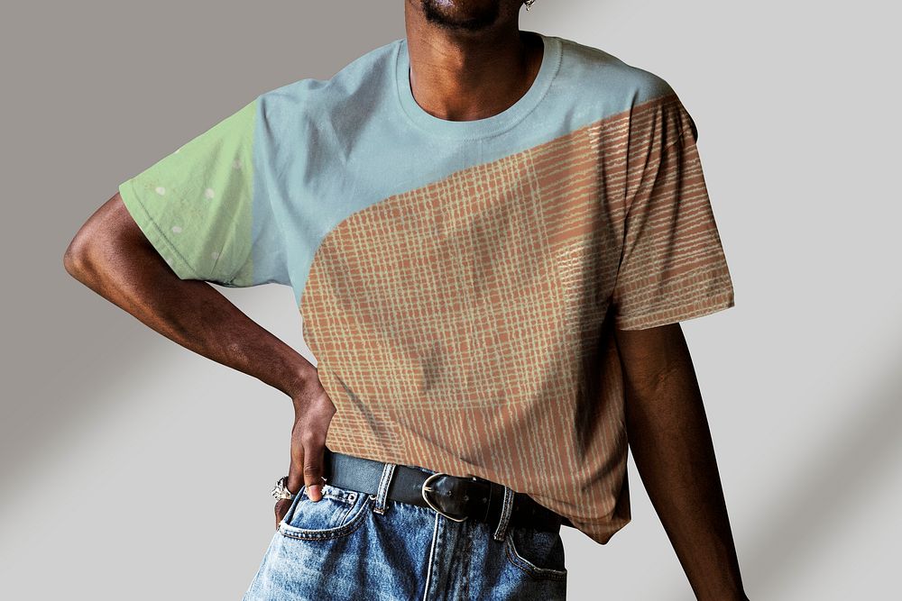 Black man wearing a hand craft patterned t-shirt mockup