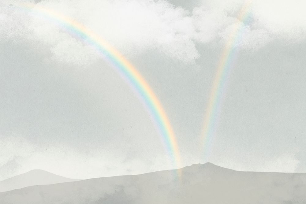Rainbow over mountains background psd with clouds