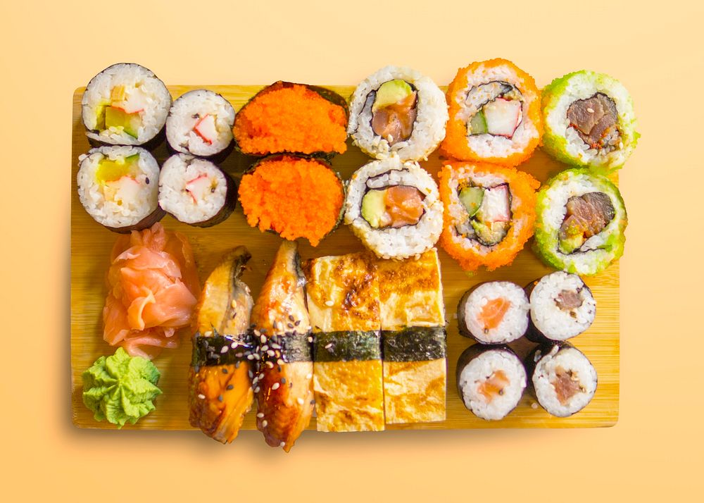 Sushi set on wooden board, food photography