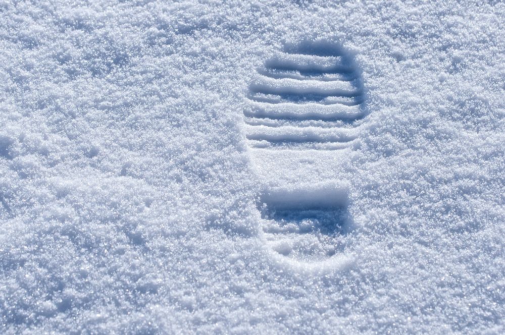 Free footrpint in snow image, public domain winter CC0 photo.