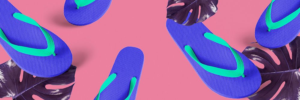 Blue flip-flops on a pink background