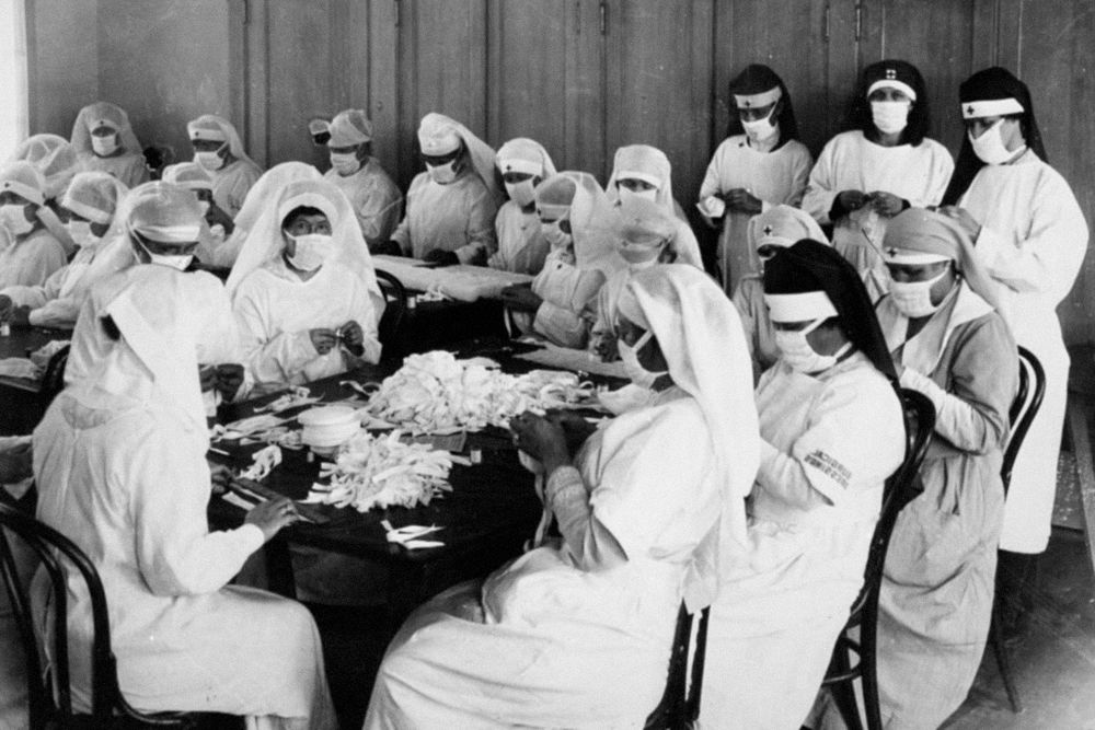 Volunteer caregivers from The American red cross during flu epidemic (1918). Original image from Oakland Public Library.…