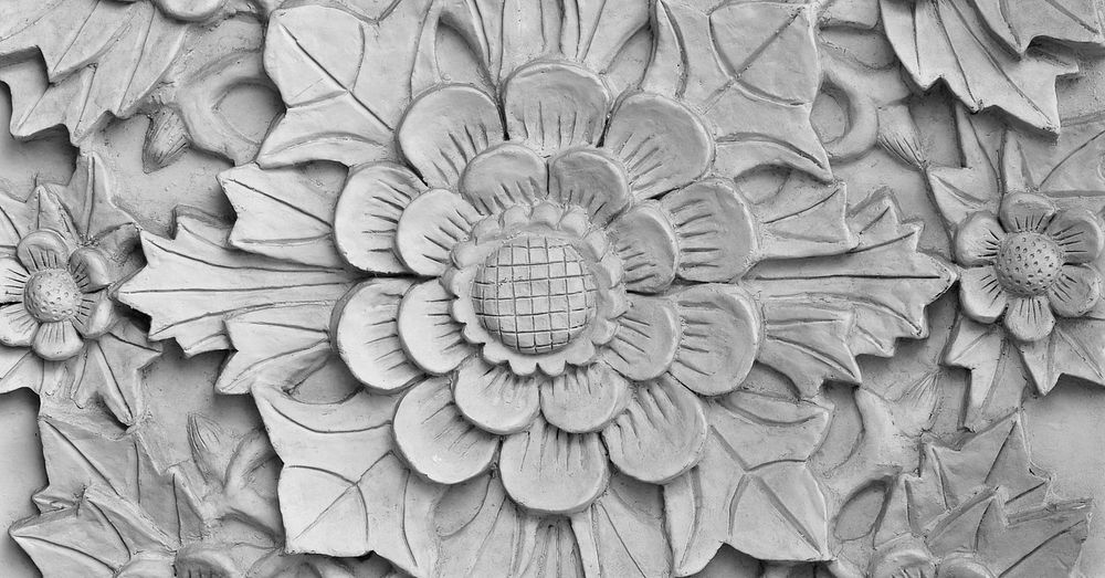 Carved floral ornament close up, white background
