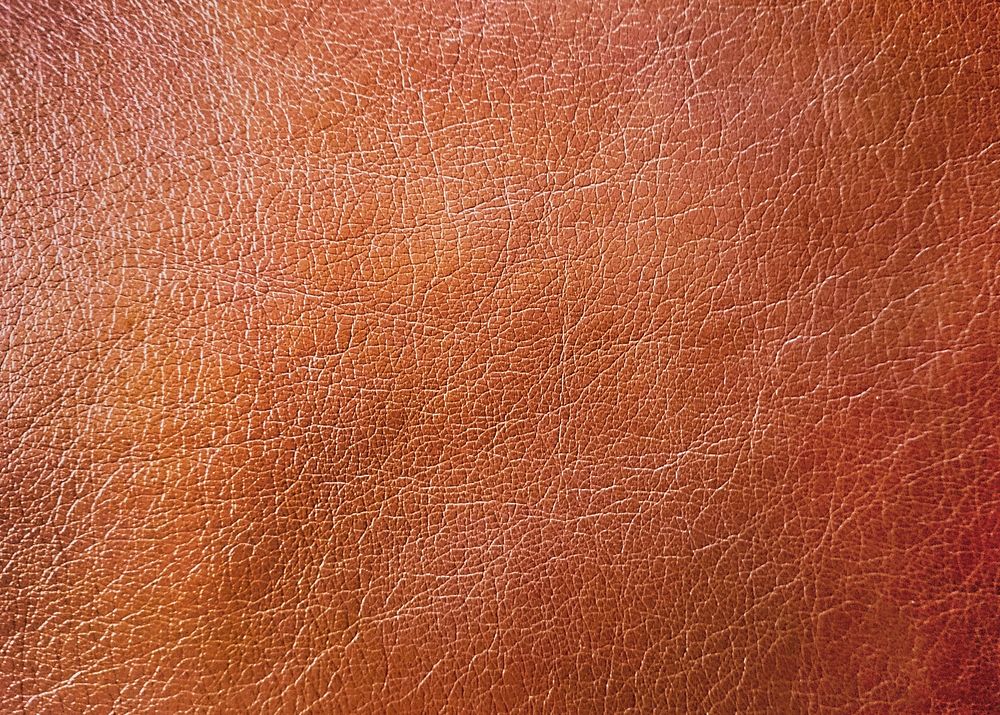 Leather texture, brown background, clothing material 