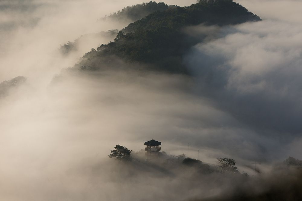 Free pavilion on foggy mountain photo, public domain nature landscape CC0 image.