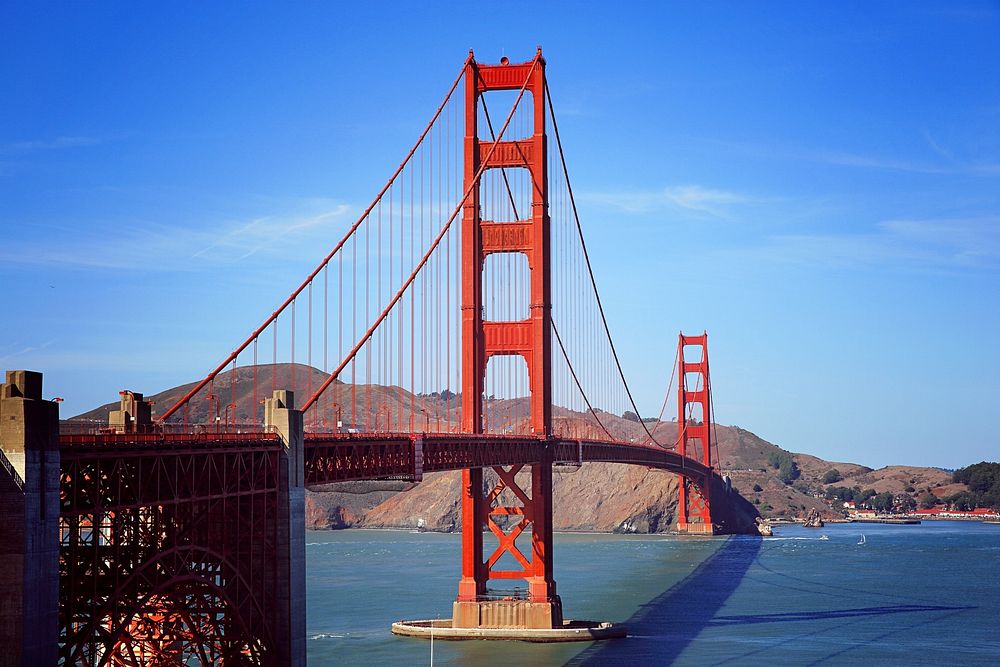 The golden gate bridge blue sky background, free public domain CC0 photo.