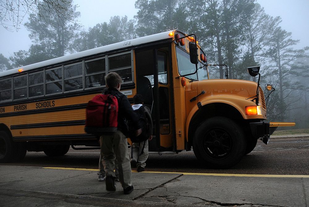 Free children boarding school bus image, public domain vehicle CC0 photo.