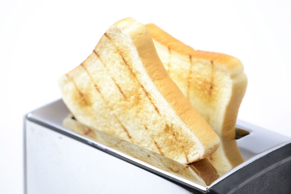 Free slice bread in toaster image, public domain food CC0 photo.