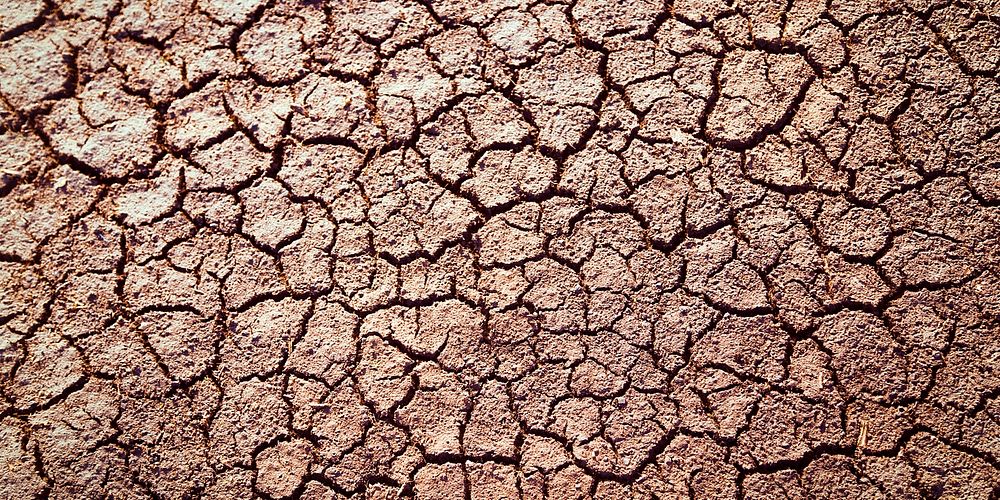 Cracked ground texture background for Facebook cover and social media banner