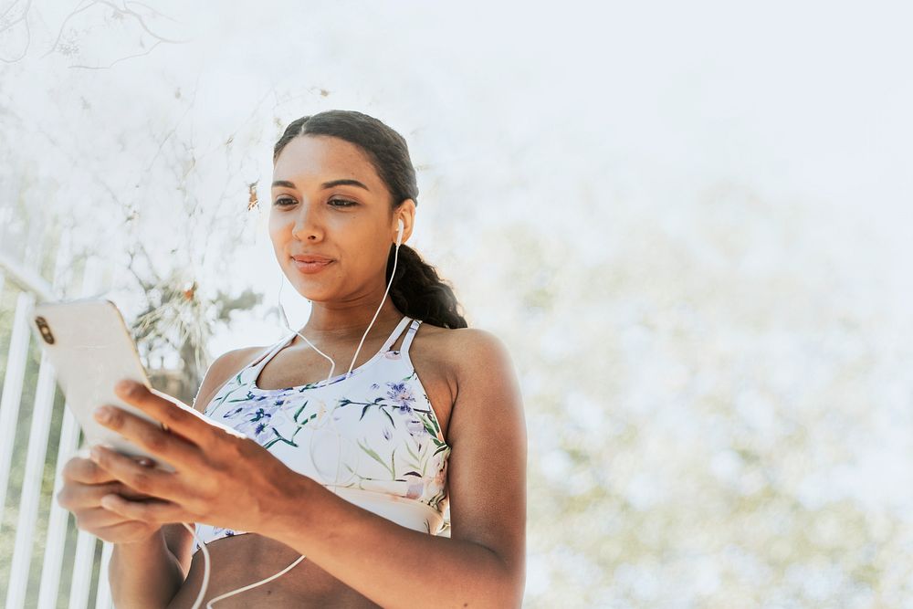 Healthy woman background, using phone while walking