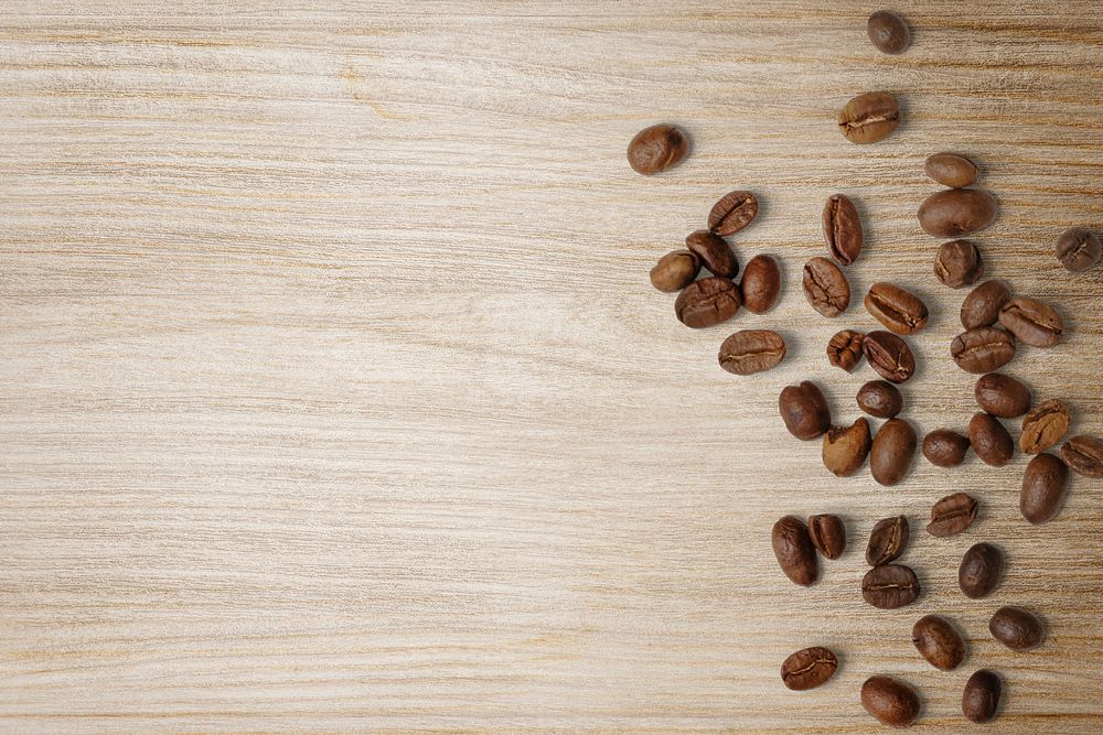 Coffee beans border, wooden background psd