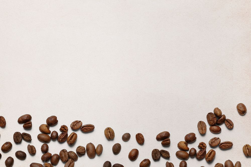 Beige background, coffee beans border