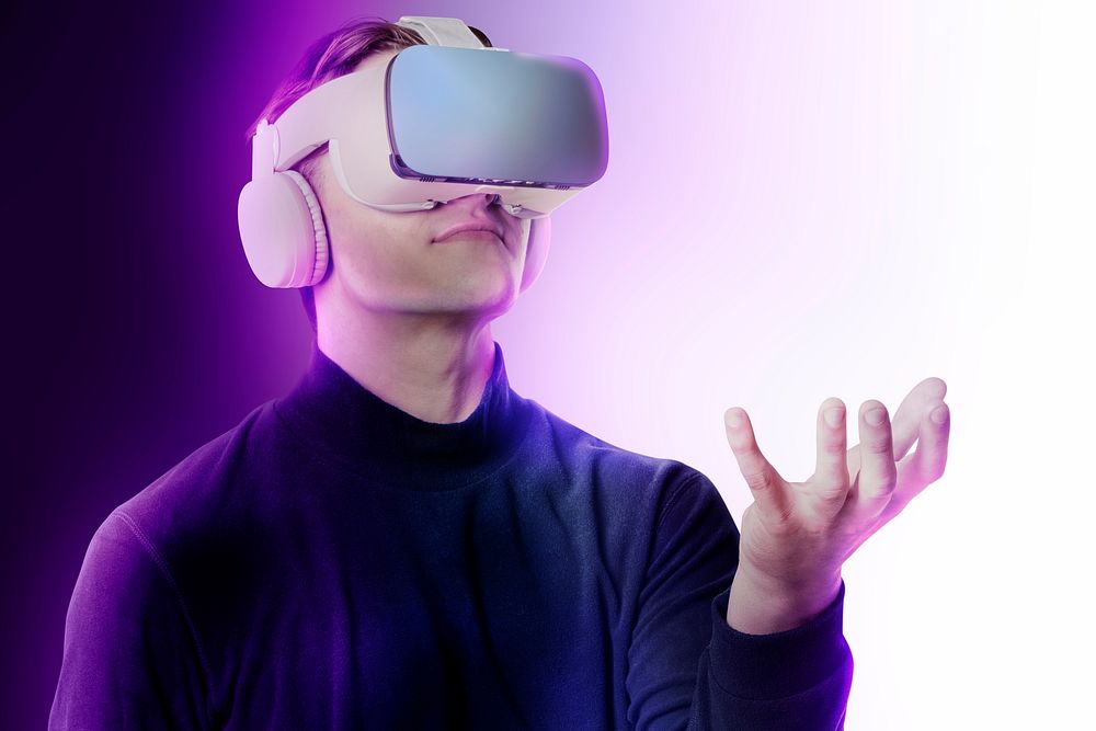 Smart technology background, man experiencing VR headset psd