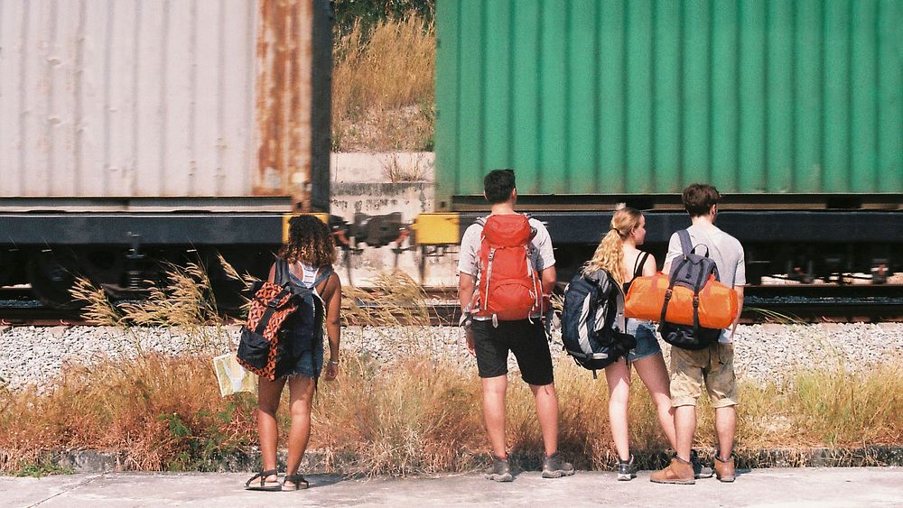 Backpackers traveling together in summer